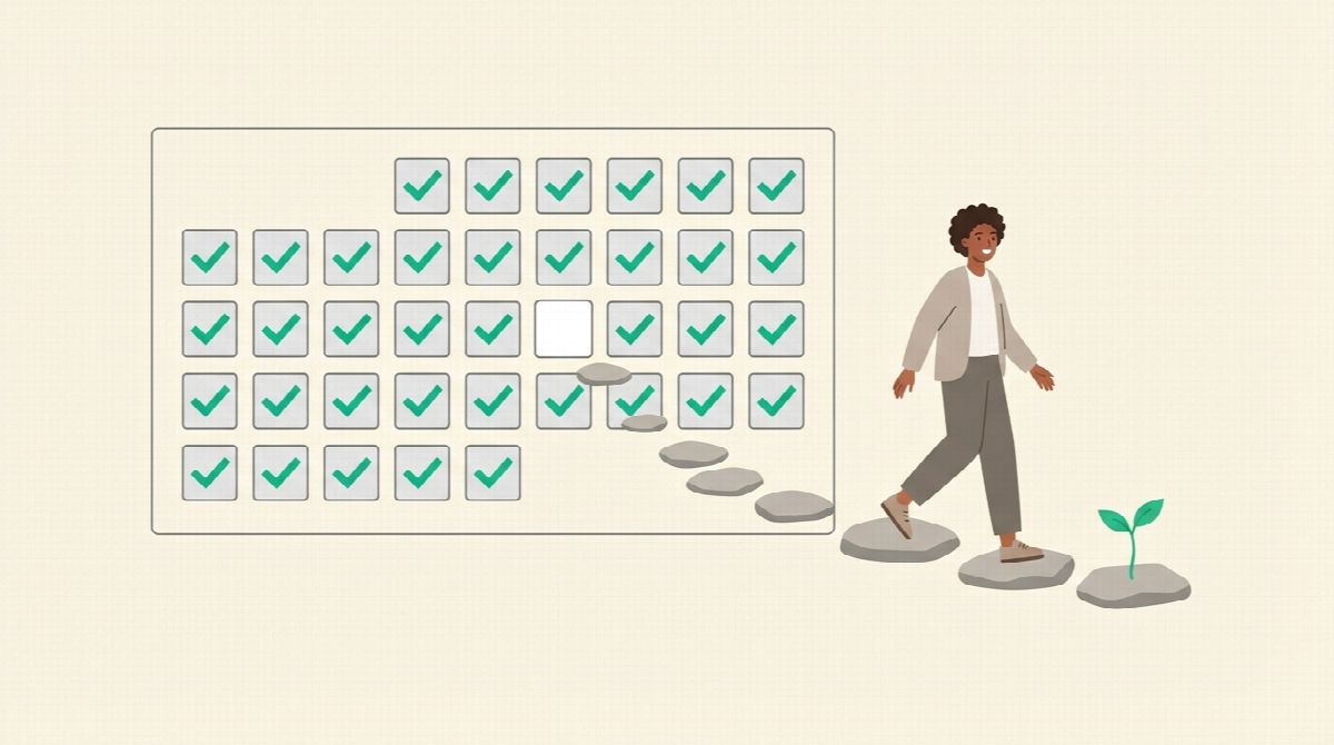A calendar full of green checkmarks with one blank day, and a person stepping onto a stone path that continues past the gap, a sprout growing on the next stone